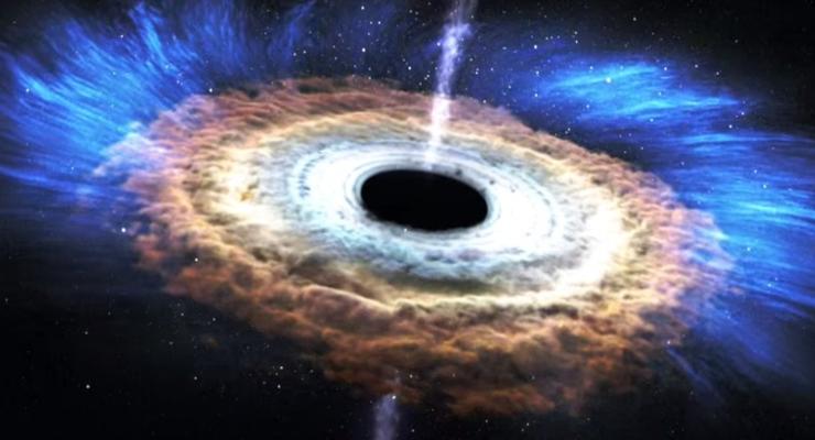 "Голодающая" черная дыра вызвала потемнение яркой галактики