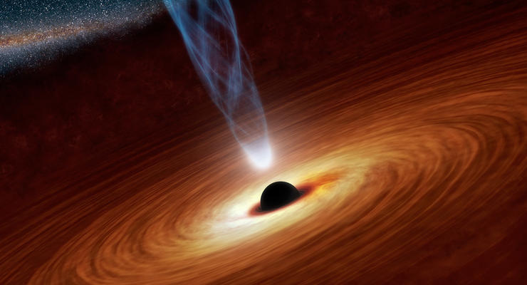Ученые обнаружили черную дыру, быстро улетающую из своей галактики после "драки" с конкуренткой