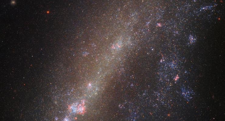 НАСА показало снимок разорванной галактики