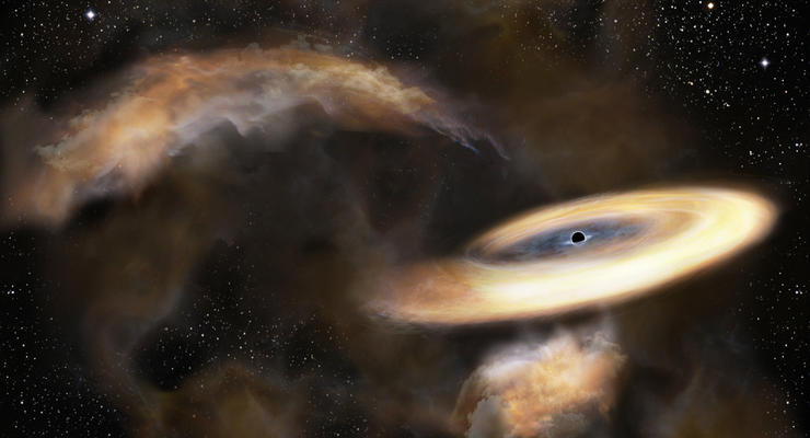 Черная дыра в центре Млечного пути засасывает другую черную дыру