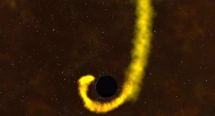NASA показало пожирание звезды черной дырой