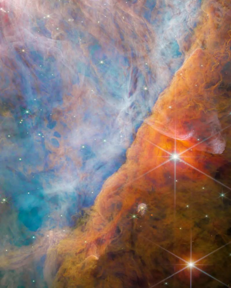 Межзвездный газ и пыль в барьере Ориона – фото NASA, ESA, CSA
